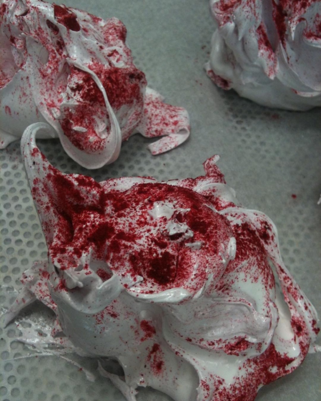 Meringue dusted with raspberry powder